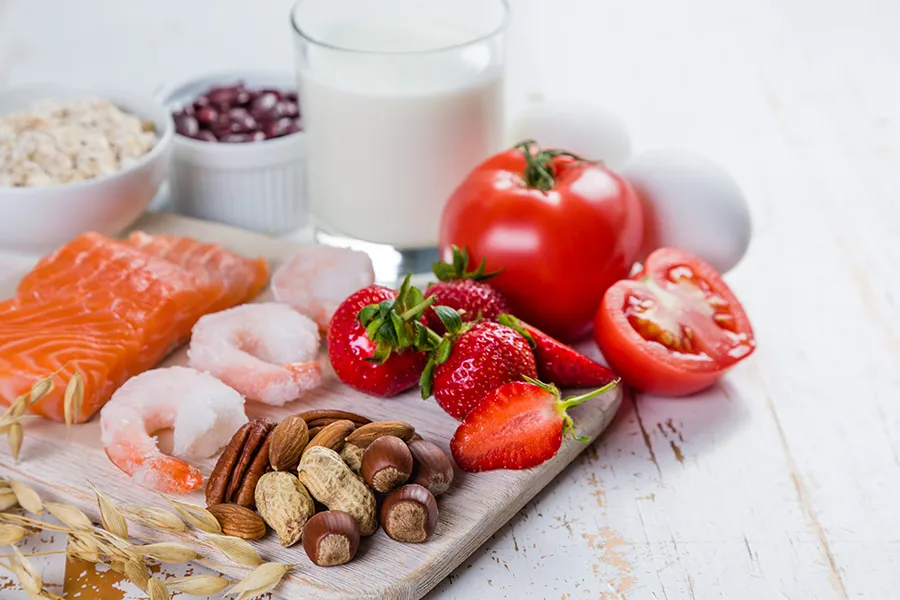 Food-Allergies-Clinic A board of foods like nuts, shellfish, and dairy, that are commonly associated with allergies. Get treatment for food allergies from Markham Natural Health Centre in Greater Toronto.
