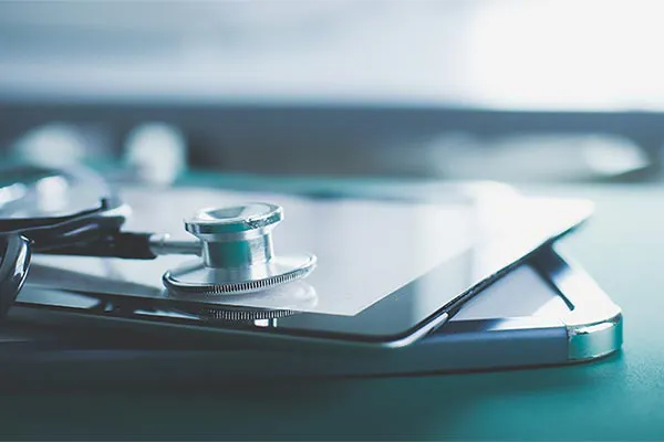 Functional-Diagnostic-Testing-Clinic Close up of a stethoscope lying on a tablet, representing advanced functional medicine testing offered by Markham Natural Health Centre in Greater Toronto.