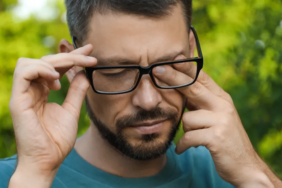 Seasonal-Allergies-Clinic A man with allergies rubs his eyes. Schedule treatment for seasonal allergies from Markham Natural Health Centre in Greater Toronto.