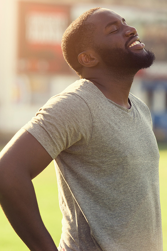 Seasonal-Allergies-Treatment A man smiles and rests after a workout. Get treatment for seasonal allergies from Markham Natural Health Centre in Greater Toronto.