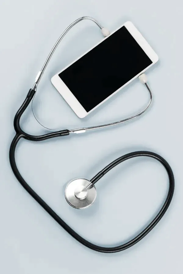 Telemedicine-Treatment A smartphone with a stethoscope attached to it, symbolizing Telemedicine treatment from Markham Natural Health Centre in Greater Toronto.